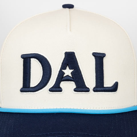 Cream and Navy Hat with DAL text on front