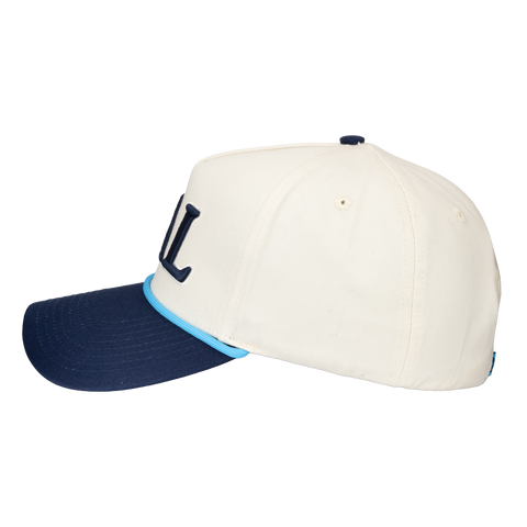 side view of cream and navy hat