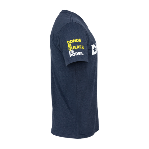 right sleeve of navy tee with Yellow and white text "DONDE EL QUERER ES PODER."