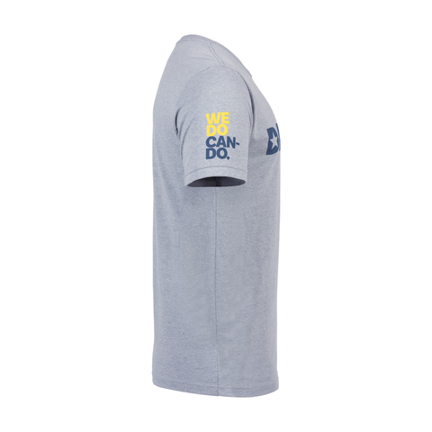side view of dark heather grey tee with yellow and dark blue text on right shoulder "WE DO CAN-DO."